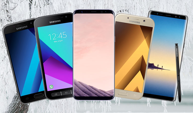Mange Samsung-mobiler med vinterlandskap i bakgrunnen